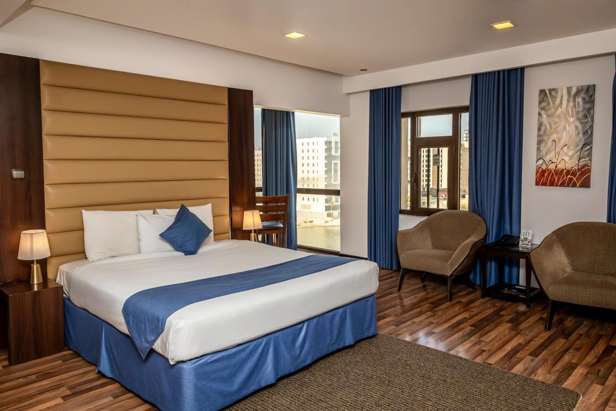 Standard King Room One King Bed Partial Sea View